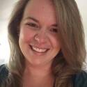 Megan Rodawold smiles with teeth.